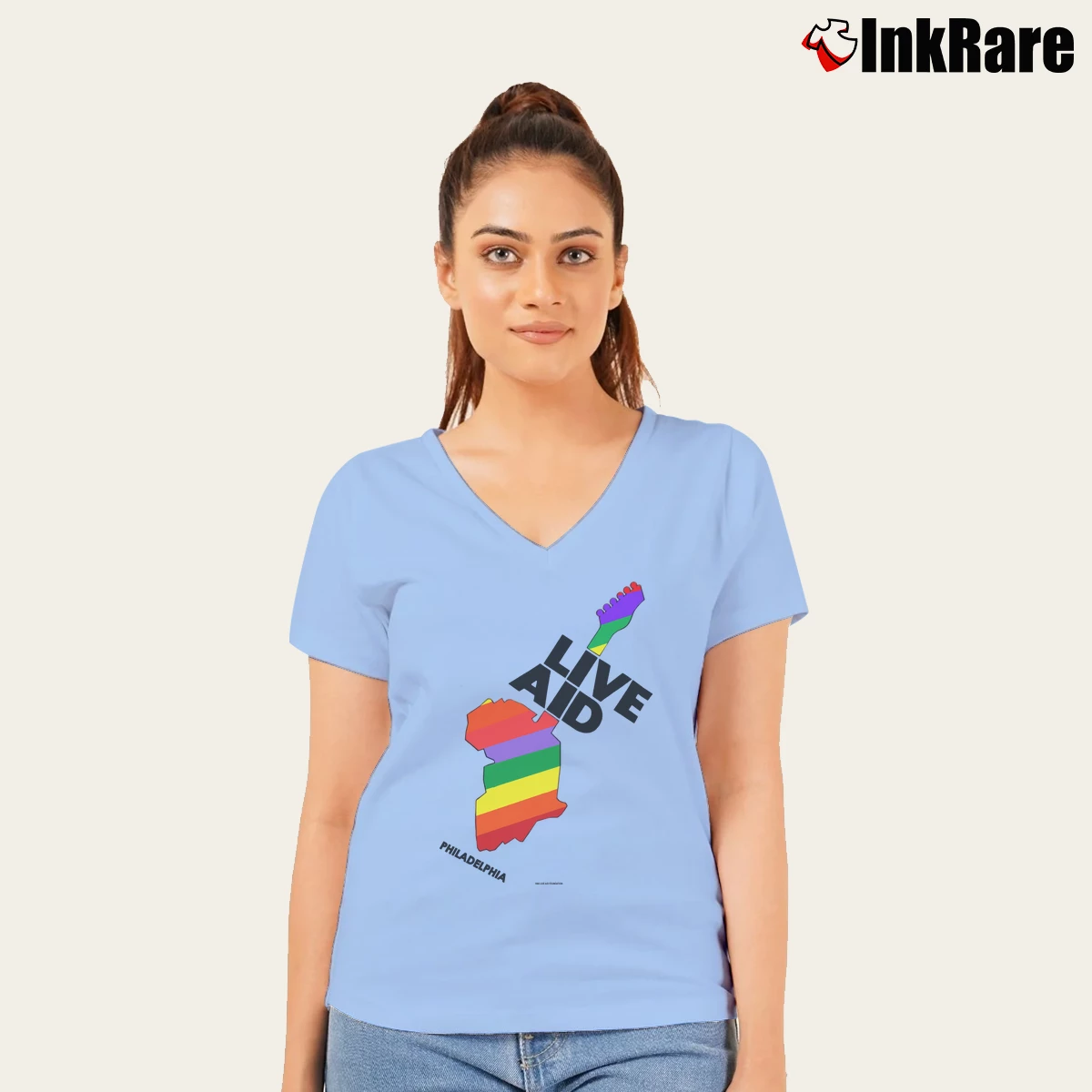 Women’s 1985 Live Aid Feed The World Rock V-Neck Tee in light blue | Chic Neckline, Soft Texture