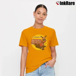 Women’s 70s Gus 1976 Mule Football Walt Disney World Disneyland Movie Cartoon Promo Signature T-Shirt in orange | Soft, Flattering Fit