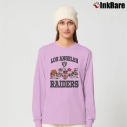 Women’s 90s Oakland Raiders NFL Looney Tunes Cartoon Long-Sleeve Top in light pink | Sleek, Versatile, All-Season