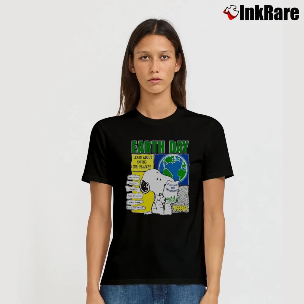 Women’s 90s Snoopy Earth Day Learn About Saving Our Planet 1990 Peanuts Comic Signature T-Shirt in black | Soft, Flattering Fit