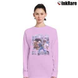 Women’s Amon - Ra St. Brown Detroit Lions Vintage Long-Sleeve Top in light pink | Sleek, Versatile, All-Season