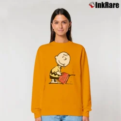 Women’s Banksy Charlie Brown Pyromaniac Snoopy Relaxed Sweatshirt in orange | Soft, Laid-Back Vibe