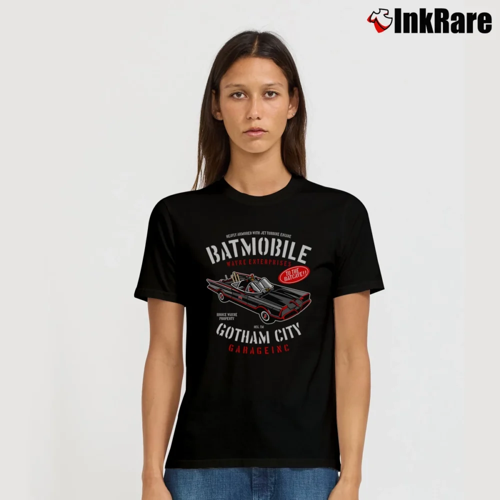 Women’s Batman Batmobile Gotham City Garage Graphic Signature T-Shirt in black | Soft, Flattering Fit