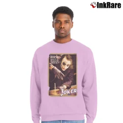 Men’s Batman The Dark Knight Joker Magic Trick Crewneck Sweatshirt in light pink | Cozy Fabric, Clean Style