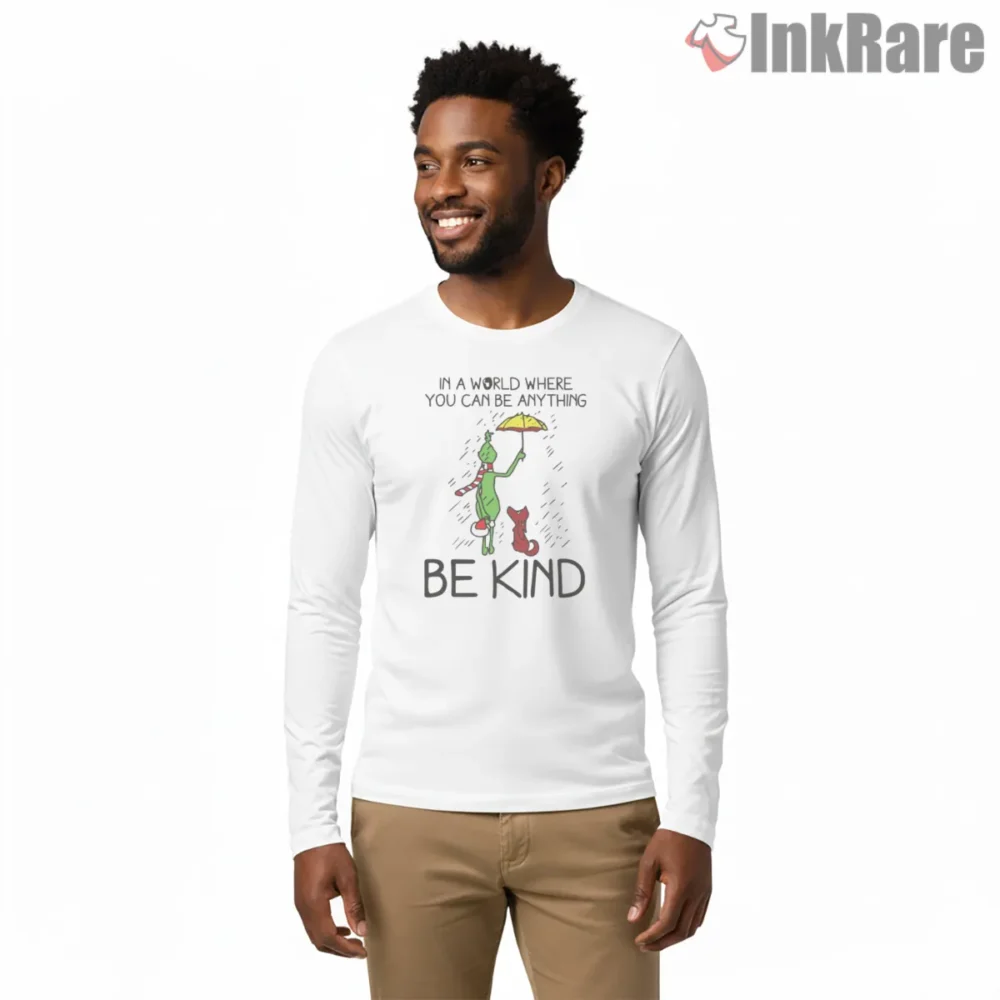 Be Kind In A World With Grinch Shirt on white long sleeve shirt for men graphic tee