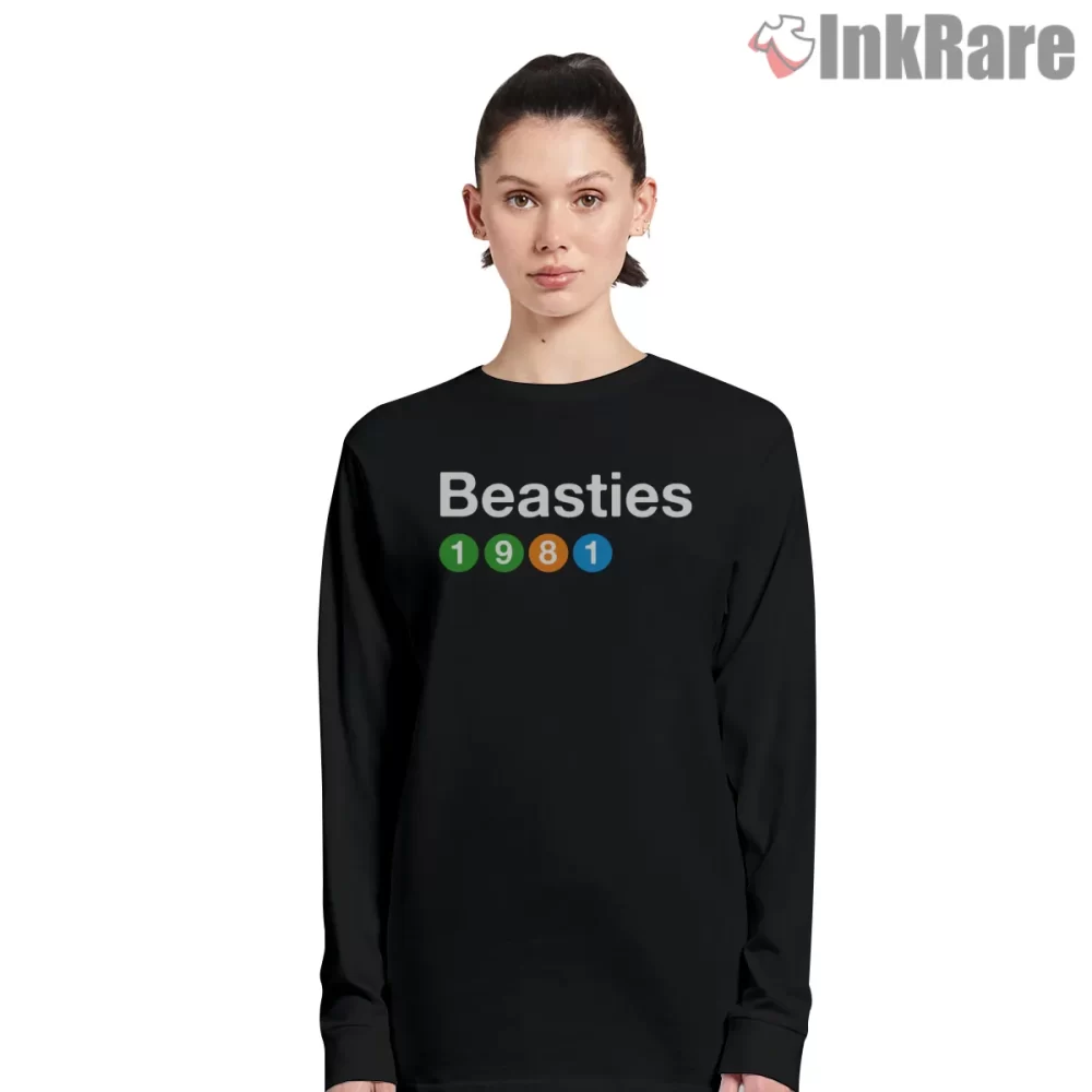 Beasties 1981 Arcade Token Logo Shirt on black long sleeve shirt for women graphic tee