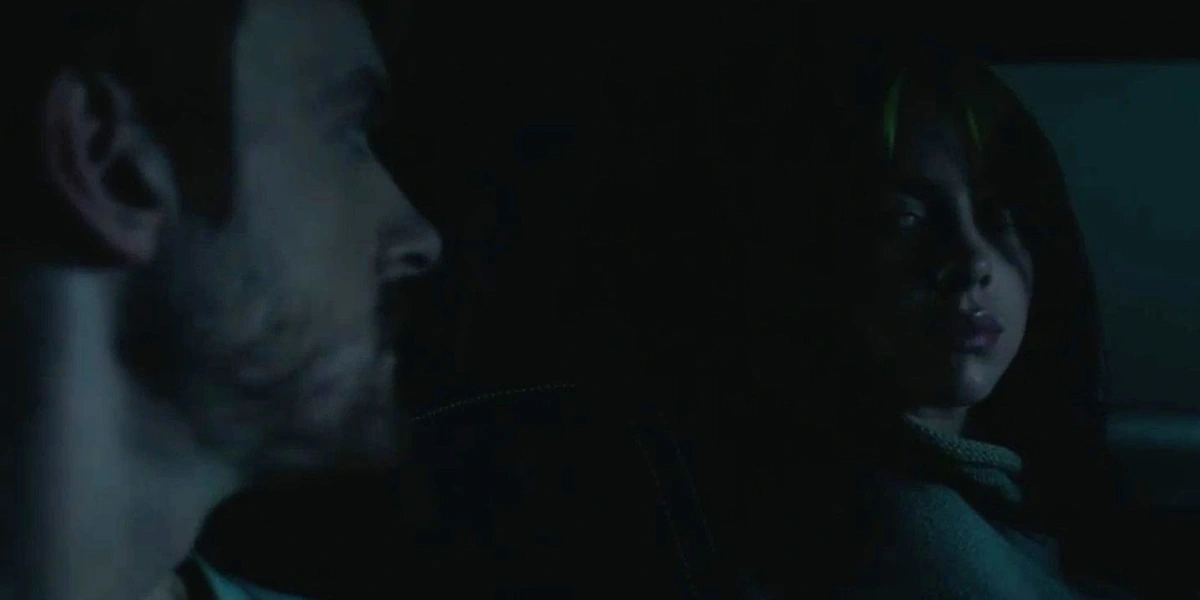 Billie Eilish and Finneas inside the dark car scene from the everything i wanted music video