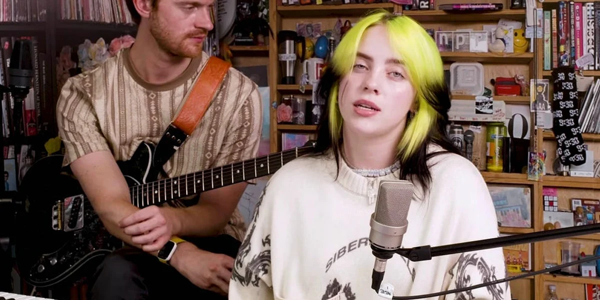 Billie Eilish and Finneas performing in a casual intimate studio session during the early internet era of Billie’s career
