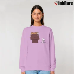 Women’s Calvin And Hobbes Sleeping On Doghouse Snoopy Relaxed Sweatshirt in light pink | Soft, Laid-Back Vibe