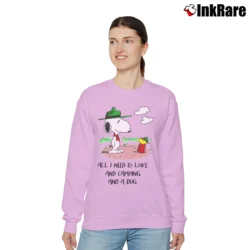 Women’s Camping Snoopy And Woodstock All I Need Is Love And Camping And A Dog Relaxed Sweatshirt in light pink | Soft, Laid-Back Vibe