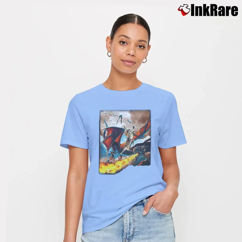 Women’s Cat Riding A Fire Breathing Dragon Funny Fantasy Signature T-Shirt in light blue | Soft, Flattering Fit