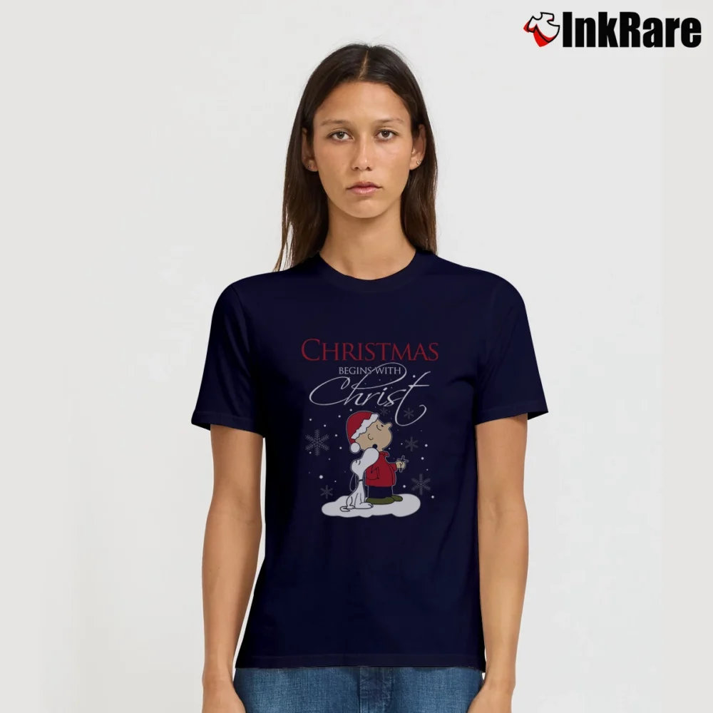 Women’s Charlie Brown And Snoopy Christmas Begins With Christ T-Shirt in navy | Soft, Flattering Fit