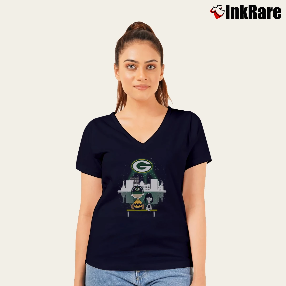 Charlie Brown And Snoopy Dog Watching City Green Bay Packers Women’s V-Neck Tee in navy – Flattering Fit Women’s Charlie Brown And Snoopy Dog Watching City Green Bay Packers V-Neck Tee in navy | Chic Neckline, Soft Texture