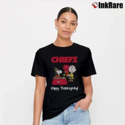 Women’s Charlie Brown And Snoopy Kansas City Chiefs Football Happy Thanksgiving T-Shirt in black | Soft, Flattering Fit