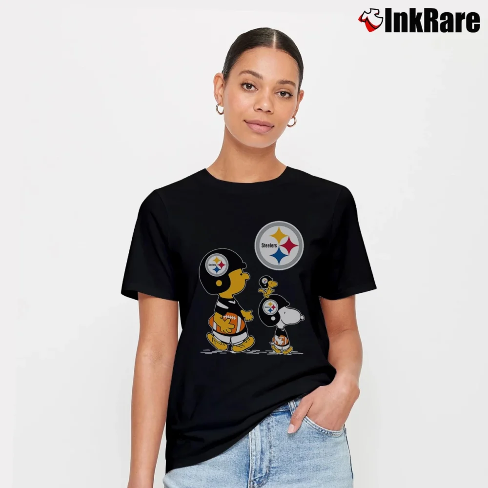 Women’s Charlie Brown Snoopy And Woodstock Pittsburgh Steelers T-Shirt in black | Soft, Flattering Fit