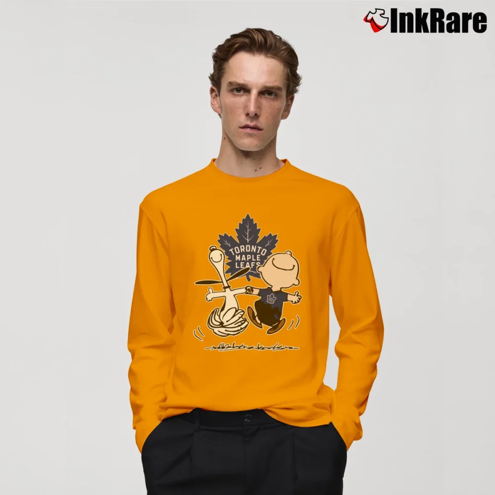 Men’s Charlie Brown Snoopy Toronto Maple Leafs Long-Sleeve Shirt in orange | Sleek, Lightweight, Year-Round Wear