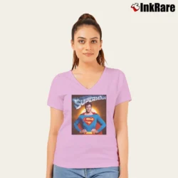 Women’s Christopher Reeve Superman Tribute Design V-Neck Tee in light pink | Chic Neckline, Soft Texture