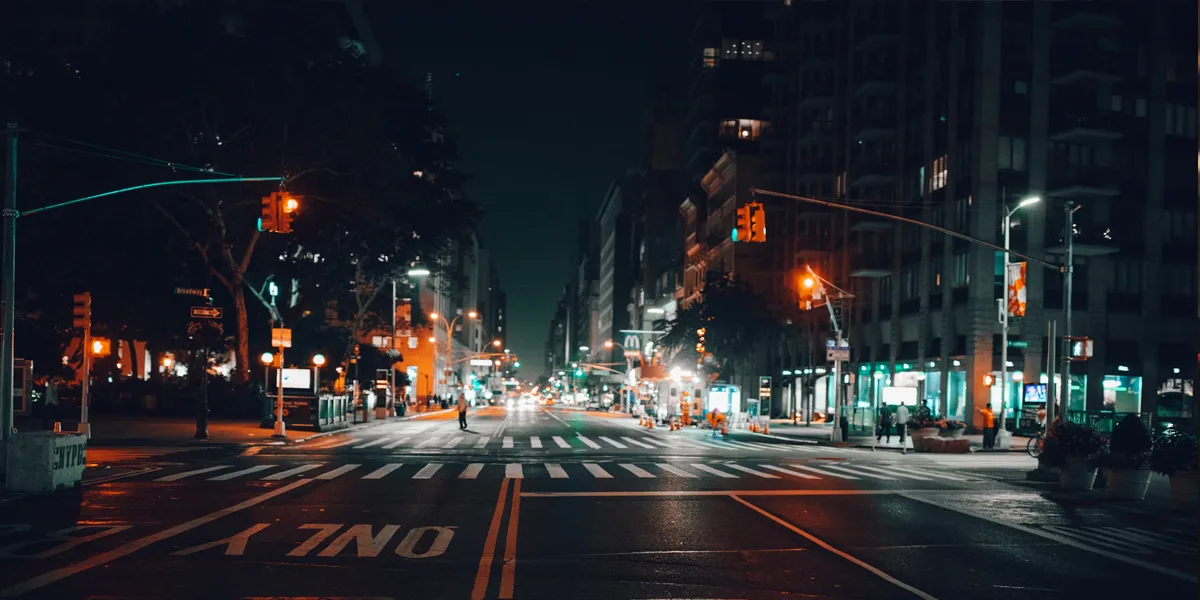 Empty city street at night reflecting the atmosphere of Lana Del Rey music