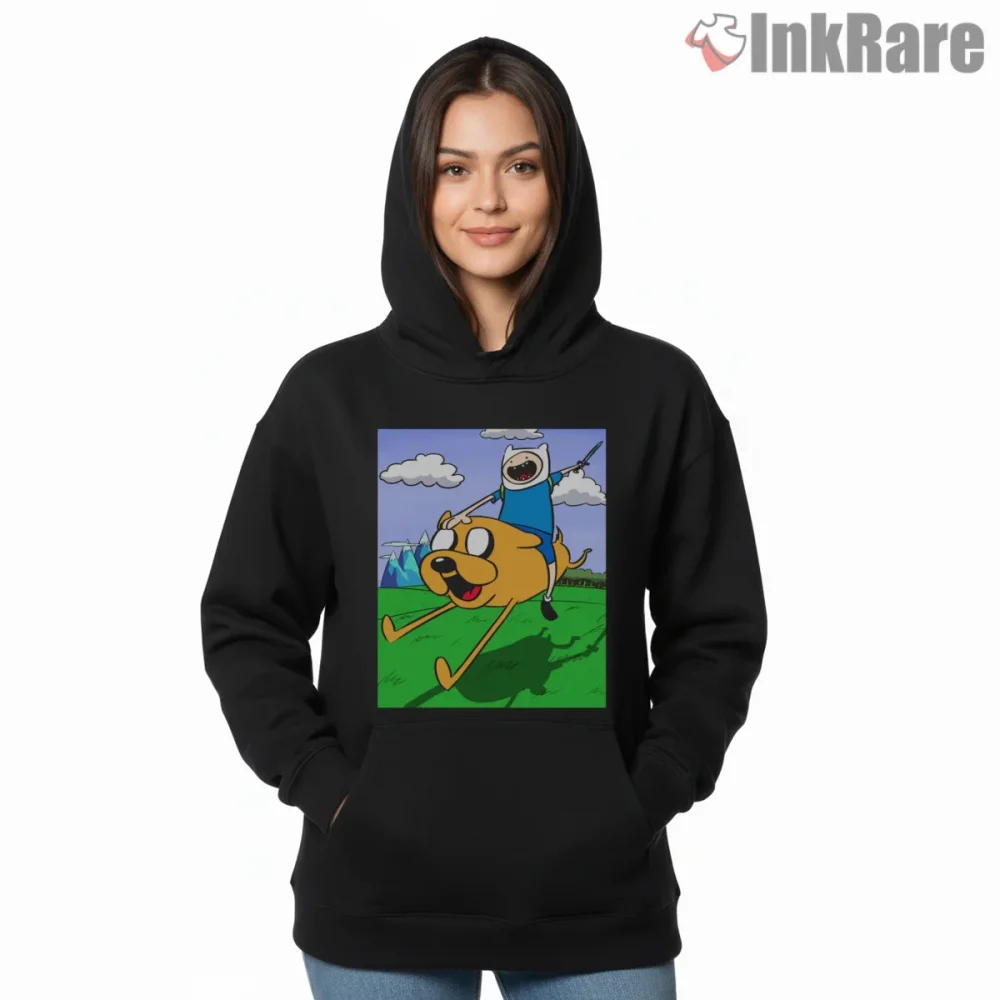 Finn Riding Jake Open Field Adventure Cartoon Shirt on black hoodie for women graphic tee