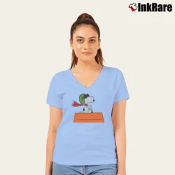 Women’s Flying Snoopy Red Baron Pilot Peanuts House V-Neck Tee in light blue | Chic Neckline, Soft Texture