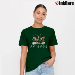 Women’s Friends Snoopy Christmas Snow Signature T-Shirt in forest green | Soft, Flattering Fit