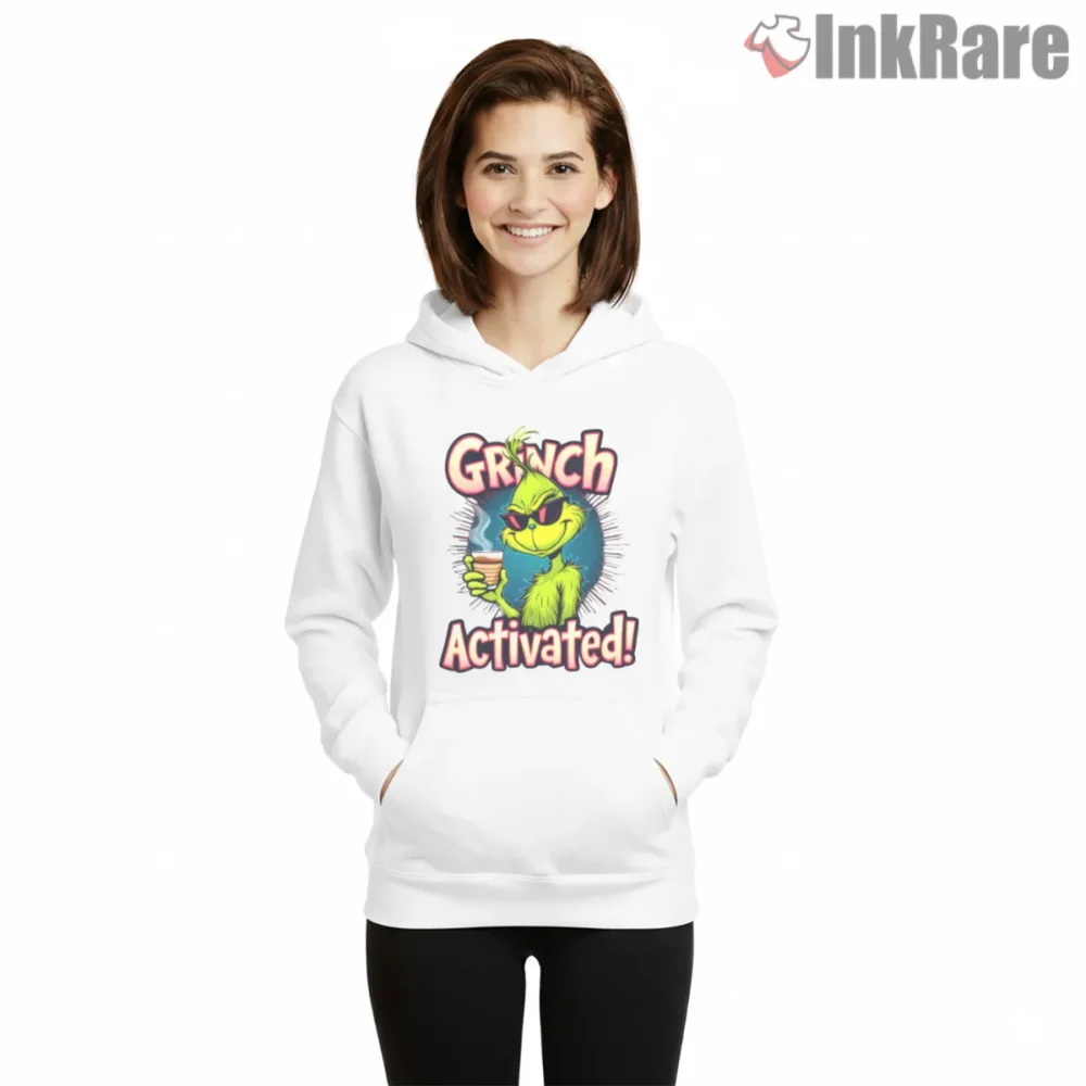 Grinch Mode Activated Merry Grinchmas 2025 Shirt on white hoodie for women graphic tee