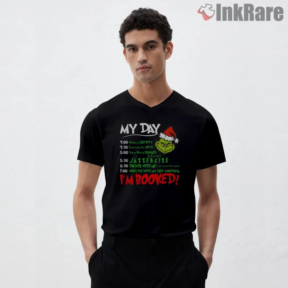 Grinch My Day Im Booked Funny Holiday Schedule Shirt on black v-neck shirt for men graphic tee
