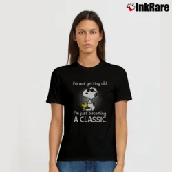 Women’s I'M Not Getting Old Snoopy I'M Just Becoming A Classic T-Shirt in black | Soft, Flattering Fit