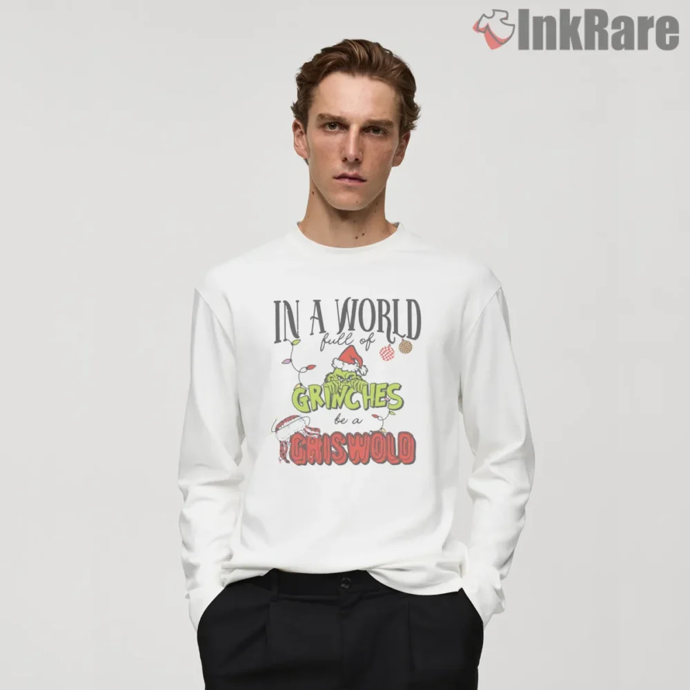 In A World Full Of Grinches Be A Griswold Christmas Shirt on white long sleeve shirt for men graphic tee