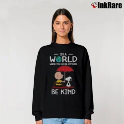 Women’s In A World Where You Can Be Anything Be Kind Snoopy Relaxed Sweatshirt in black | Soft, Laid-Back Vibe