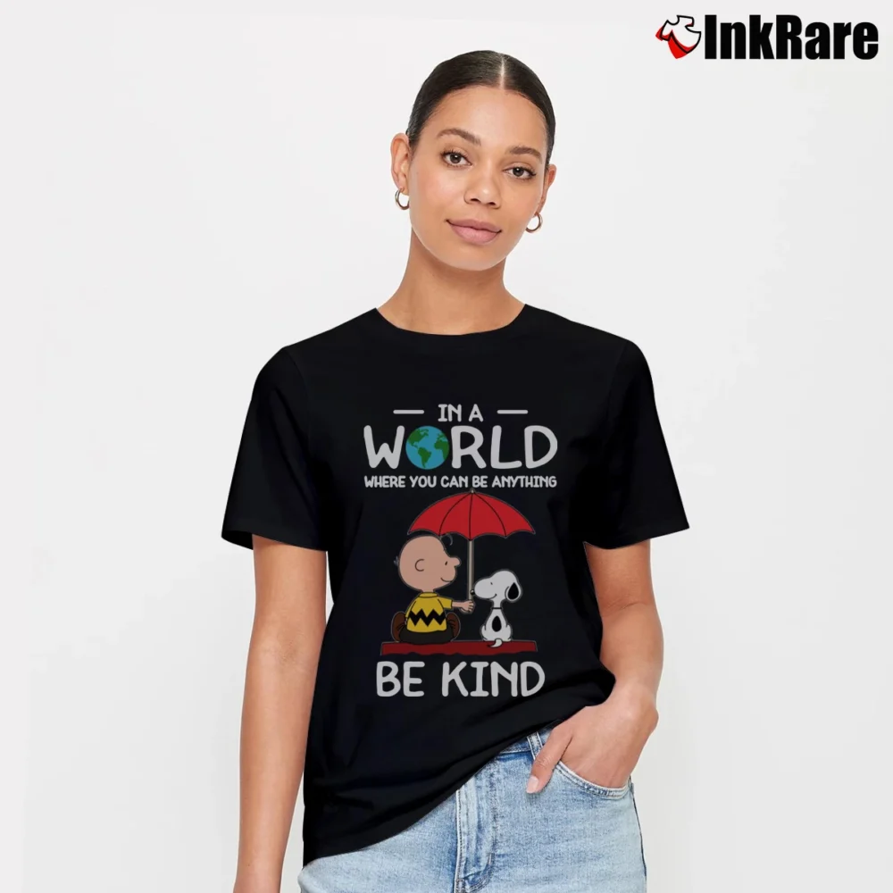 Women’s In A World Where You Can Be Anything Be Kind Snoopy Signature T-Shirt in black | Soft, Flattering Fit