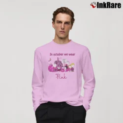 Men’s In October We Wear Pink Snoopy Breast Cancer Awareness Long-Sleeve Shirt in light pink | Sleek, Lightweight, Year-Round Wear