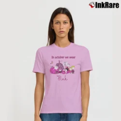 Women’s In October We Wear Pink Snoopy Breast Cancer Awareness Signature T-Shirt in light pink | Soft, Flattering Fit