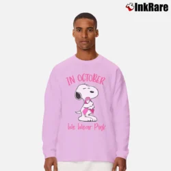 Men’s In October We Wear Pink Snoopy Breast Cancer Long-Sleeve Shirt in light pink | Sleek, Lightweight, Year-Round Wear