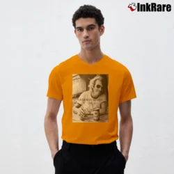 Men’s Jimmy Buffett Legends Never Die V-Neck Tee in orange | Sharp, Breathable, Everyday Staple