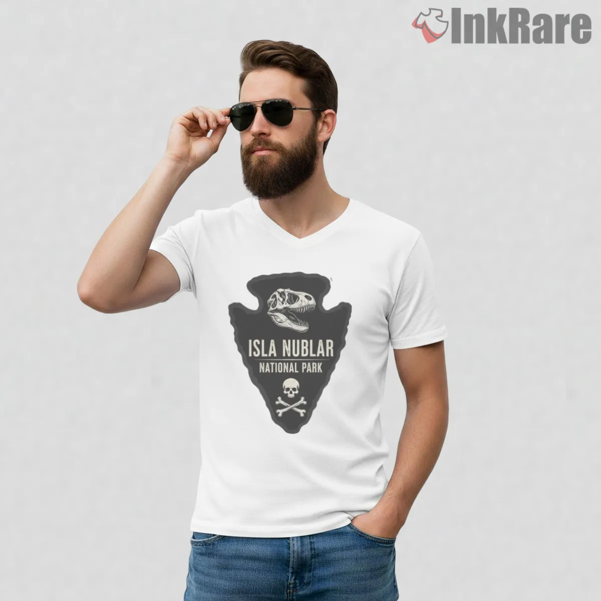 Jurassic Park Isla Nublar Fossil Arrowhead Emblem V Neck White Jurassic Park Isla Nublar Fossil Arrowhead Emblem Shirt on white v-neck shirt for men graphic tee