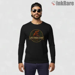 Jurassic Park Life Finds A Way T Rex Emblem Shirt on black long sleeve shirt for men graphic tee