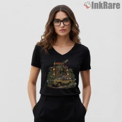Jurassic Park Vintage T Rex Jeep Jungle Adventure Shirt on black v-neck shirt for women graphic tee