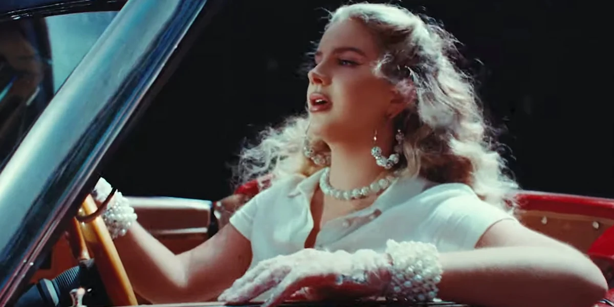 Lana Del Rey driving at night in the Chemtrails Over the Country Club music video