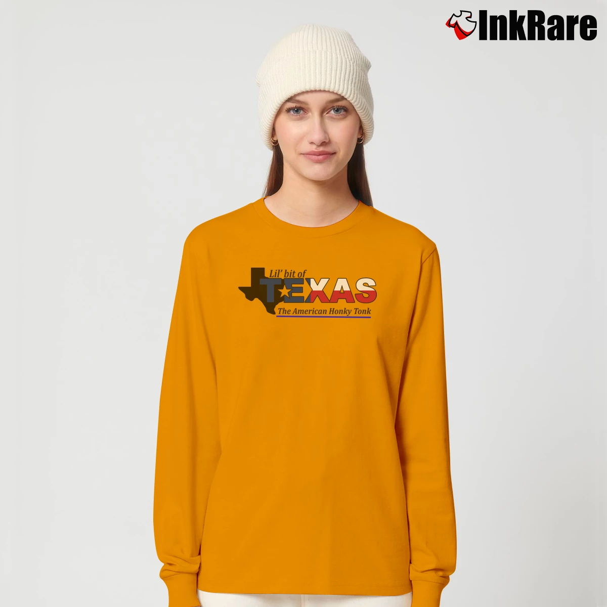 Lil Bit Of Texas The American Honky Tonk Women’s Long-Sleeve Top in orange – Effortless Layer Women’s Lil Bit Of Texas The American Honky Tonk Long-Sleeve Top in orange | Sleek, Versatile, All-Season