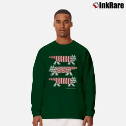 Men’s Lisa Larson Uniqlo Cat Long-Sleeve Shirt in forest green | Sleek, Lightweight, Year-Round Wear