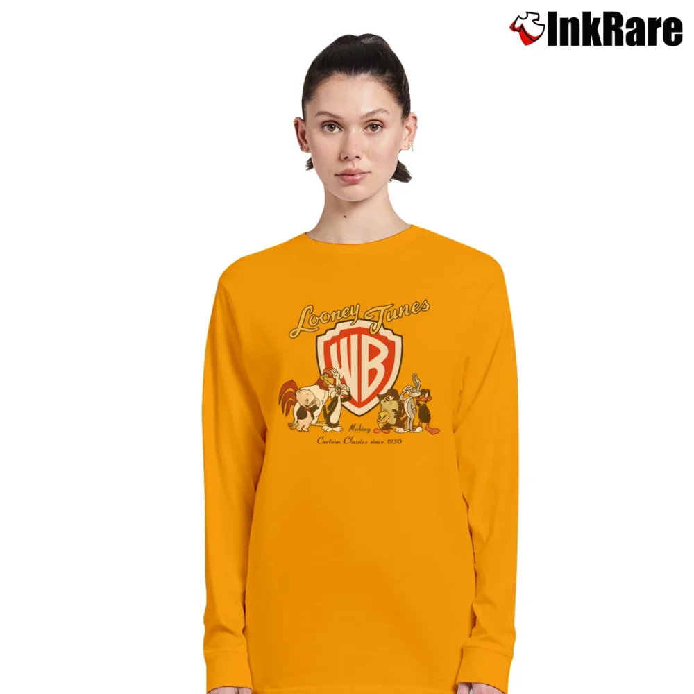 Women’s Looney Tunes Warner Bros Logo Long-Sleeve Top in orange | Sleek, Versatile, All-Season