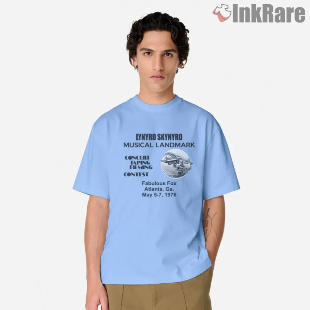 Lynyrd Skynyrd 1976 Filming Contest Shirt front view on light blue short sleeve