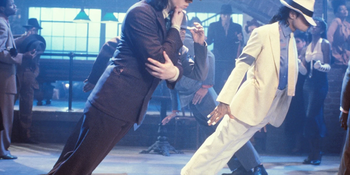 Michael Jackson performing the famous Smooth Criminal lean that became one of the most iconic dance moves in pop history