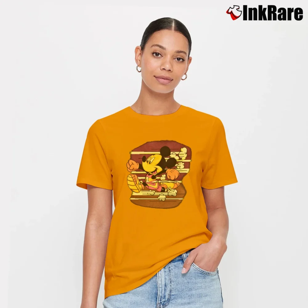Women’s Mickey Donald Unlimited Track And Field Signature T-Shirt in orange | Soft, Flattering Fit
