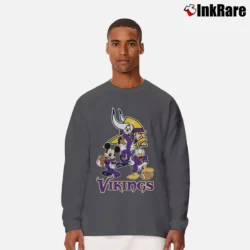 Men’s Minnesota Vikings Mickey Mouse Donald Goofy Football Long-Sleeve Shirt in charcoal | Sleek, Lightweight, Year-Round Wear