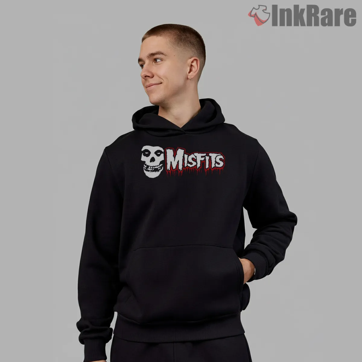 Misfits Dripping Wordmark Skull Icon Shirt on black hoodie for men graphic tee