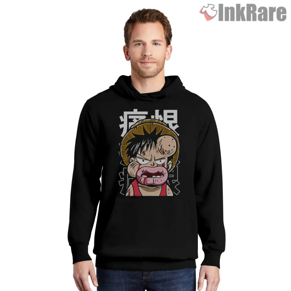Monkey D Luffy Beaten Up Comedic Anime Face Shirt on black hoodie for men graphic tee