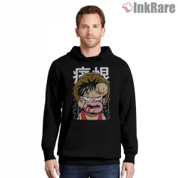 Monkey D Luffy Beaten Up Comedic Anime Face Shirt on black hoodie for men graphic tee