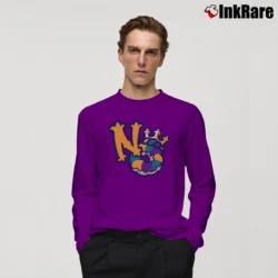 Men’s New Orleans Baby Cakes Logo Tech Long-Sleeve Shirt in purple | Sleek, Lightweight, Year-Round Wear